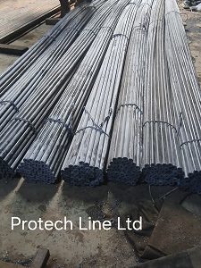 A close-up of a heavy-duty black plastic tube insulator designed for an electric fence, showcasing its smooth surface and uniform cut